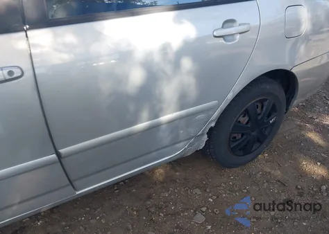 2004 Toyota Corolla Le from USA, damaged, VIN 1NXBR32EX4Z298110